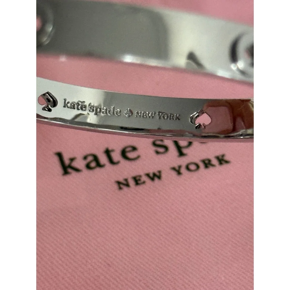 Kate Spade New York Silver Tone Spade Logo Hinged Bangle Bracelet with Dust Bag
